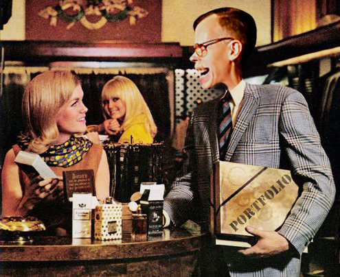 close-up of revised old magazine print ad for Playboy Magazine asking what sort of man reads Playboy with illustrator Mark Armstrong holding coffee-stained portfolio and getting admiring glances from two beautiful women