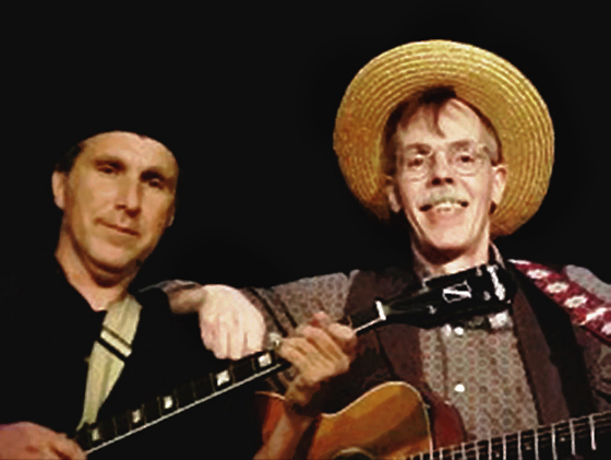 Michael Mike Cohen and Mark Armstrong guitar and banjo musicians for musical version of Spoon River Anthology presented by Branch River Theater in Marlborough New Hampshire
