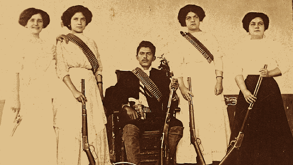 Mexican group portrait one man four women posing with guns rifles bandoliers heart bullets bang bang my babies shot me down