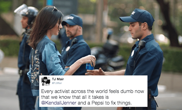 Kendall Jenner Pepsi protest marchers ad handing Pepsi to young cop derogatory tweet ridiculing gesture phoniness of ad itself