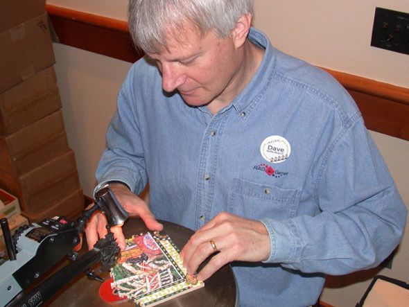 Dave Beffa owner Fool's Gold Puzzles cutting custom wooden jigsaw puzzle